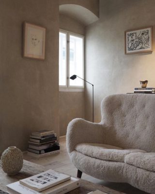 habitacion zona de estar en tonos rosa